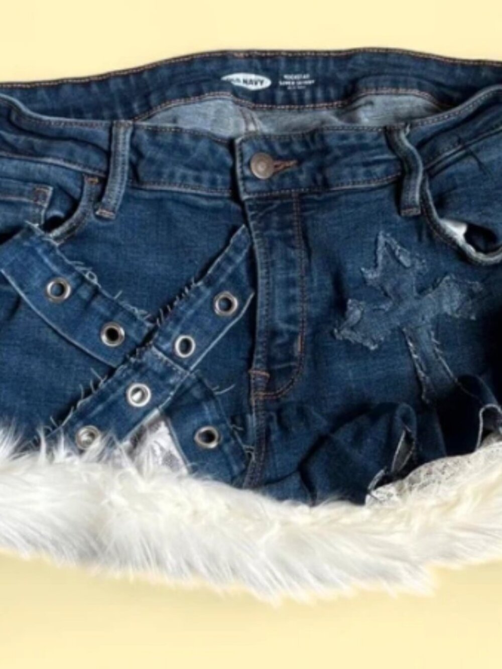 Personalized ripped denim shorts with rough edges
